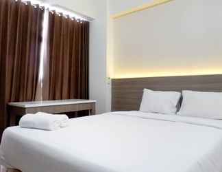 Bilik Tidur 2 Modern and Stylish Studio at Taman Melati Surabaya Apartment By Travelio