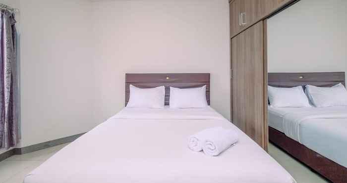 Kamar Tidur Comfy and Minimalist Studio at Tamansari Semanggi Apartment By Travelio