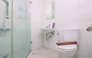 In-room Bathroom 4 Comfy and Minimalist Studio at Tamansari Semanggi Apartment By Travelio