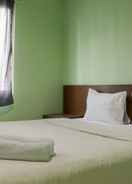 BEDROOM Cozy and Enjoy Living 2BR at City Home Apartment near MOI Kelapa Gading By Travelio