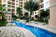 Swimming Pool Cozy and Enjoy Living 2BR at City Home Apartment near MOI Kelapa Gading By Travelio