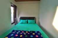 Kamar Tidur Villa Keluarga Bukit Iskandaria