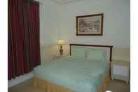 Bedroom Twin Pillars Guesthouse Syariah