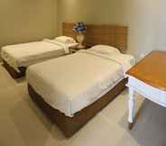 Kamar Tidur 7 Heroes Hotel