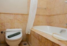 In-room Bathroom 6 Strategic 2BR Apartment at Istana Sahid Sudirman By Travelio