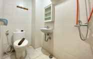In-room Bathroom 6 Cozy 2BR at Pinewood Jatinangor Apartment By Travelio