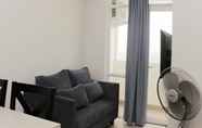 Lobi 2 Comfy and High Floor 1BR at Vasanta Innopark Apartment By Travelio