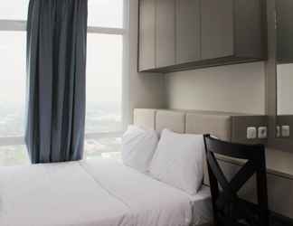 Bedroom 2 Comfy and High Floor 1BR at Vasanta Innopark Apartment By Travelio