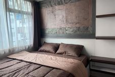 침실 The Jarrdin Apartment by Libergory