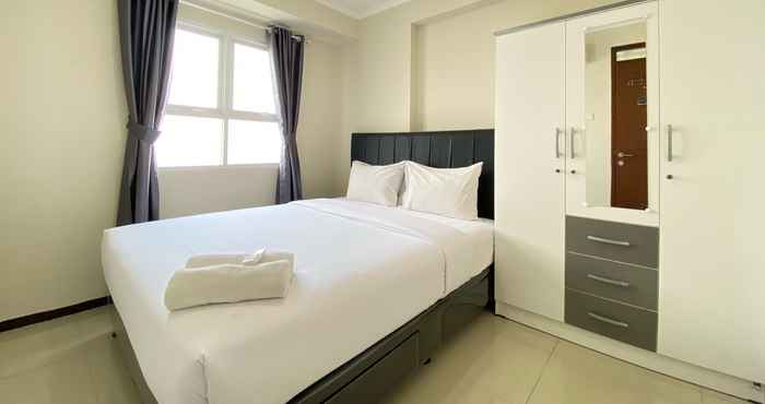 Bedroom Homey 2BR at Gateway Pasteur Apartment By Travelio