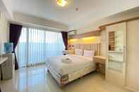 Bedroom Homey Furnished Studio Apartment at Beverly Dago By Travelio