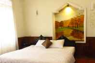 Phòng ngủ Enjoy Hotel Hue