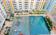 Swimming Pool 7 Comfort and Nice 1BR at Paramount Skyline Apartment By Travelio