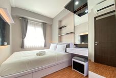 ห้องนอน Homey 2BR at Mekarwangi Square Cibaduyut Apartment By Travelio