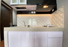 พื้นที่สาธารณะ 5 Homey 2BR at Mekarwangi Square Cibaduyut Apartment By Travelio