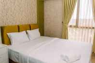 Bedroom Warm and Minimalist 2BR at Sky House BSD Apartment By Travelio