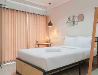 Bedroom 2 Cozy Studio Apartment at Patraland Amarta By Travelio