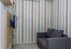Ruang Umum 2 Comfy and Spacious 1BR at Green Pramuka City Apartment By Travelio