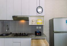 Ruang Umum 3 Comfy and Spacious 1BR at Green Pramuka City Apartment By Travelio