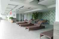 Lobby Cozy Studio Apartment at Mataram City By Travelio