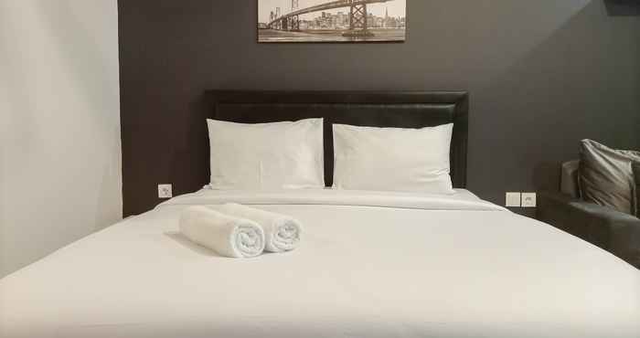 Kamar Tidur Cozy Studio Apartment at Mataram City By Travelio