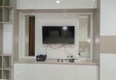 Common Space 2 Nice Studio Apartment at Patraland Amarta By Travelio