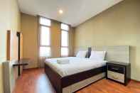 Bedroom Cozy 2BR at Dago Butik Apartment By Travelio