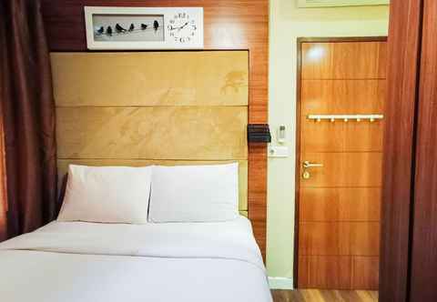 Bedroom Luxury Classic 2BR at Vida View Makassar Apartment By Travelio