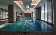 Swimming Pool 7 1BR Bali Style Luxury Apartment at BRANZ BSD City by Travelio