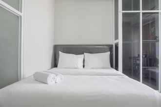 Kamar Tidur 4 Homey and Warm Studio at Seasons City Latumenten Apartment By Travelio