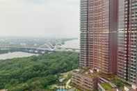 Bangunan Comfort and Nice 1BR at Gold Coast Apartment By Travelio