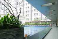 Swimming Pool Comfort and Nice Studio at Taman Melati Sinduadi Apartment By Travelio