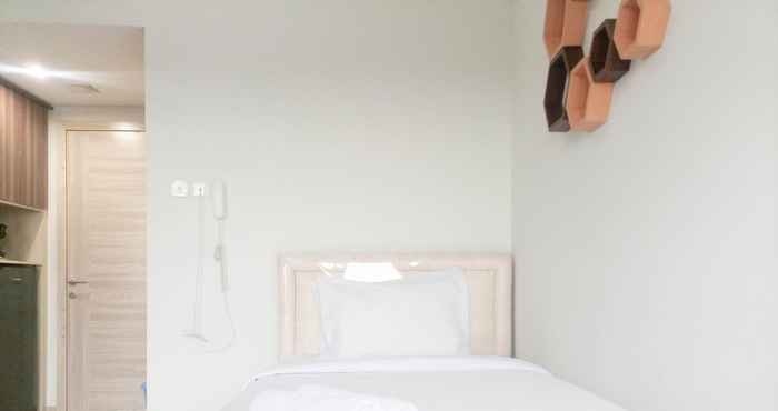 Bedroom Cozy Studio Apartment at Taman Melati Sinduadi By Travelio