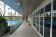 Kolam Renang Cozy Studio Apartment at Taman Melati Sinduadi By Travelio