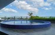 Swimming Pool 4 Simply and Comfort Studio Room at Mataram City Apartment By Travelio