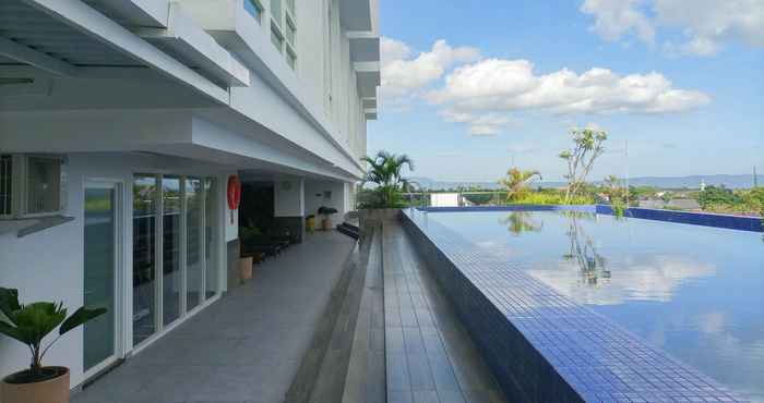 Swimming Pool Simply and Comfort Studio Room at Mataram City Apartment By Travelio