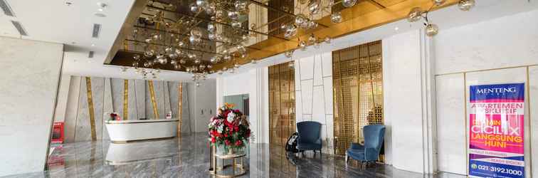 Lobby Cozy and Nice Studio at Menteng Park Apartment By Travelio