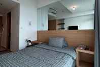 ห้องนอน Qnmrooms at Treepark City