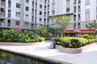 Exterior Comfort 1BR Apartment with Wardrobe Room at Green Bay Pluit By Travelio