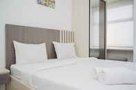 Kamar Tidur Fully Furnished Studio Apartment at Serpong Garden By Travelio