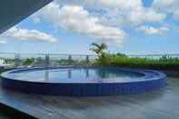 Swimming Pool Comfy and Elegant Studio Mataram City Apartment By Travelio