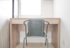 Common Space 7 Comfort and Minimalist Studio at Belmont Residence Puri Apartment By Travelio