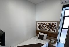 Bedroom 6 Mulia Hotel Syariah