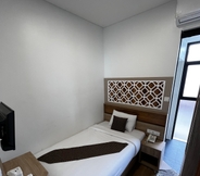 Kamar Tidur 6 Mulia Hotel Syariah