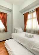 BEDROOM Comfy 2BR at Suites @Metro Apartment By Travelio