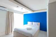 Bedroom Warm and Comfort Studio Room at Amethyst Kemayoran Apartment By Travelio