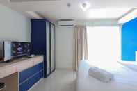 Lobby Warm and Comfort Studio Room at Amethyst Kemayoran Apartment By Travelio