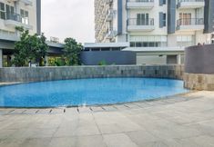 Lobby 6 Comfort and Nice 1BR at Casa De Parco Apartment By Travelio