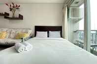 Bedroom Spacious Minimalist Studio Room at Apartment Galeri Ciumbuleuit 1 By Travelio