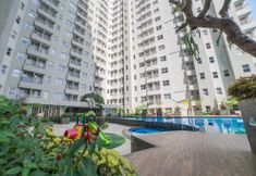 Lobby 6 Furnished Homey 2BR Apartment at Parahyangan Residence By Travelio